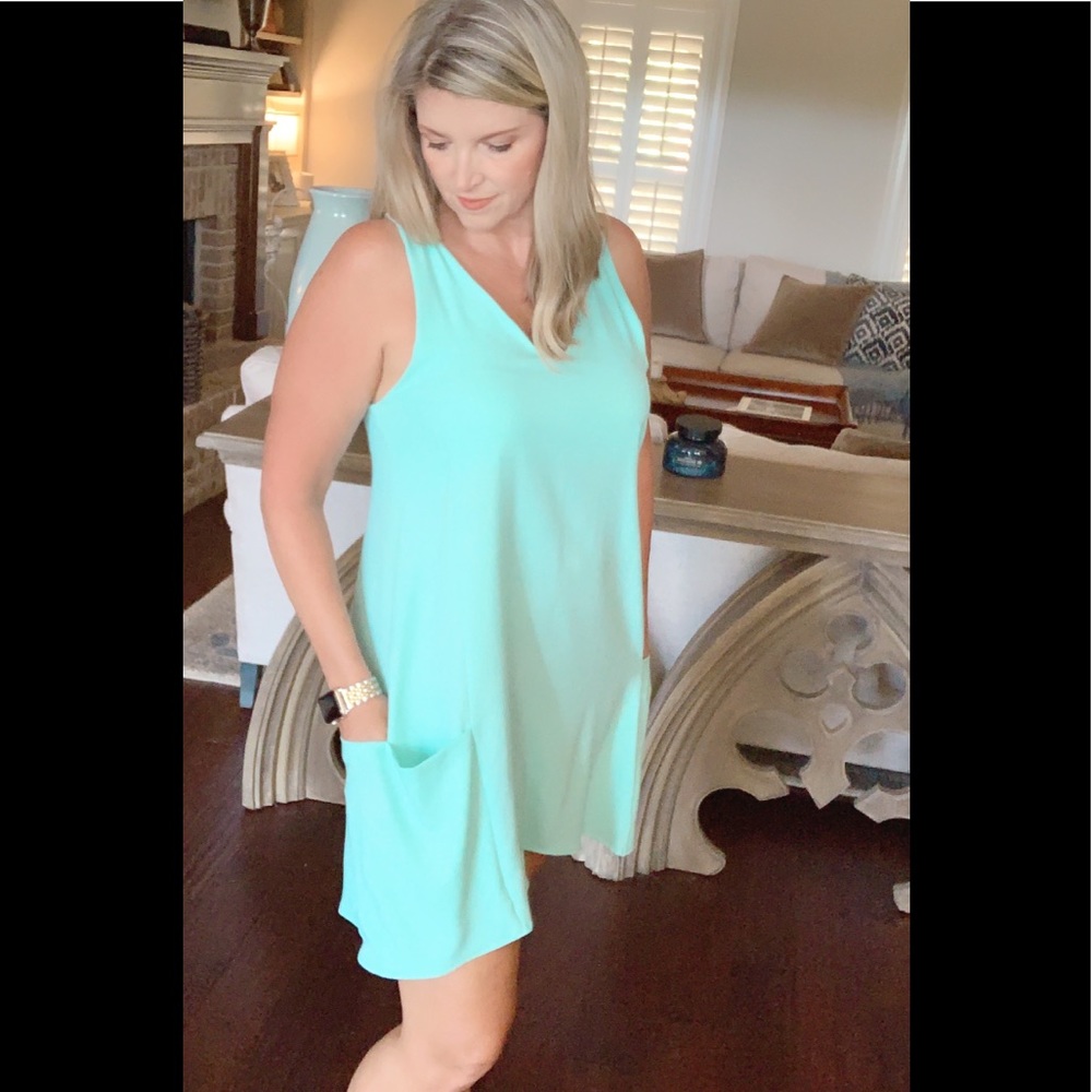 Light aqua casual sleeveless mini dress.